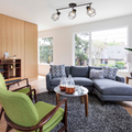 Living room with the Keele Track Lighting Kit hanging beautifully over a grey couch