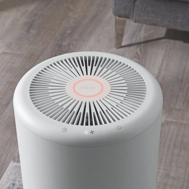 Aerial view of large air-purifier in a home environment - indicator ring red