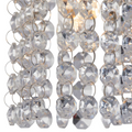 Close up for Cora track light pendant crystals - illuminated light bulb
