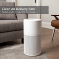 Large white air purifier in a home environment