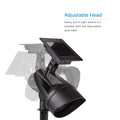 Solar powered LED path light showing its adjustable head with multiple light positions