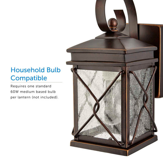  Paisly Outdoor Wall Lantern on a white background angled to the left displaying the bulb inside