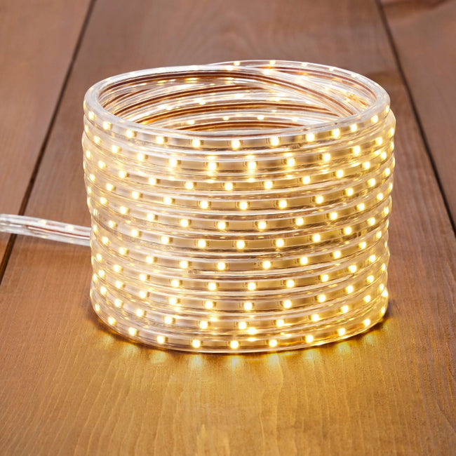 NOMA 23 Ft Flexible LED Rope Light - Warm White, Coiled Stack on Wooden Floor