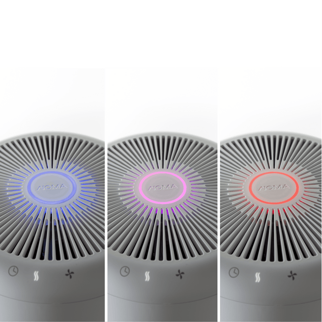 Aerial view of three large air-purifier lined up with three different indicator ring colors - red, pink, blue