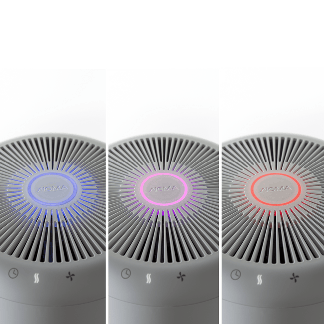 Aerial view of three medium air-purifiers lined up with three different indicator ring colors - red, pink, blue